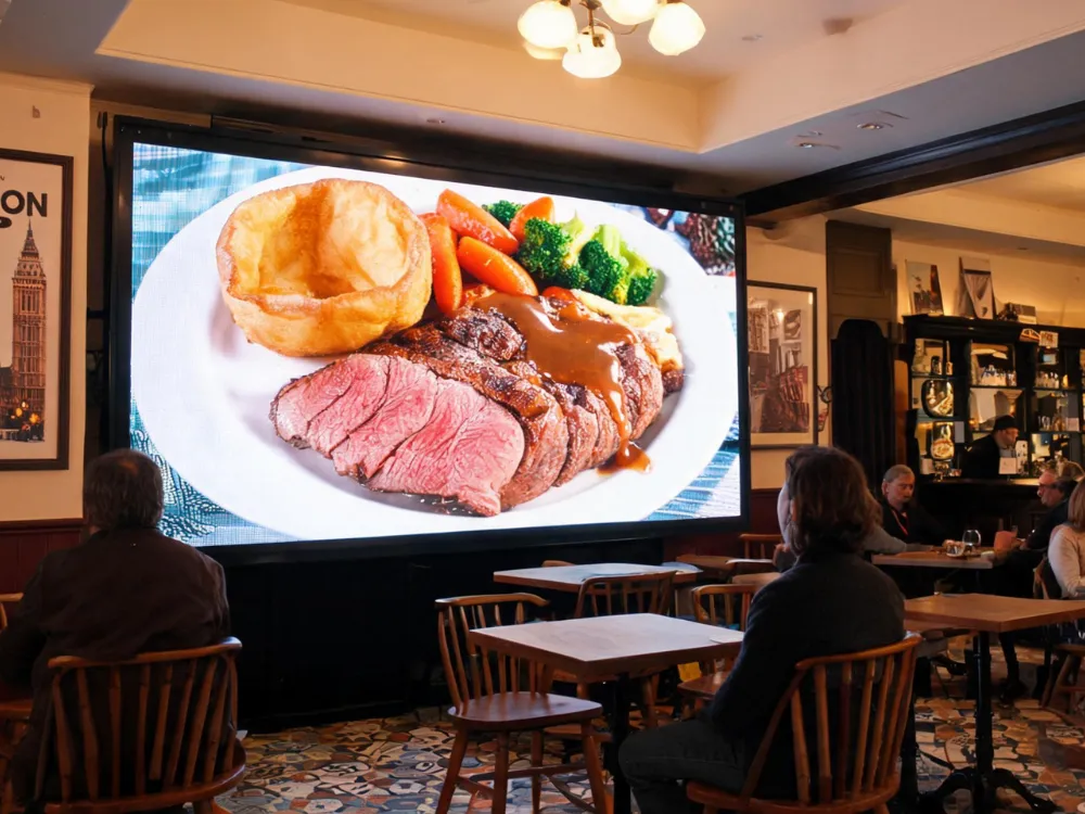 GHC 1.25 mm fine pitch LED display integrated into a UK restaurant interior